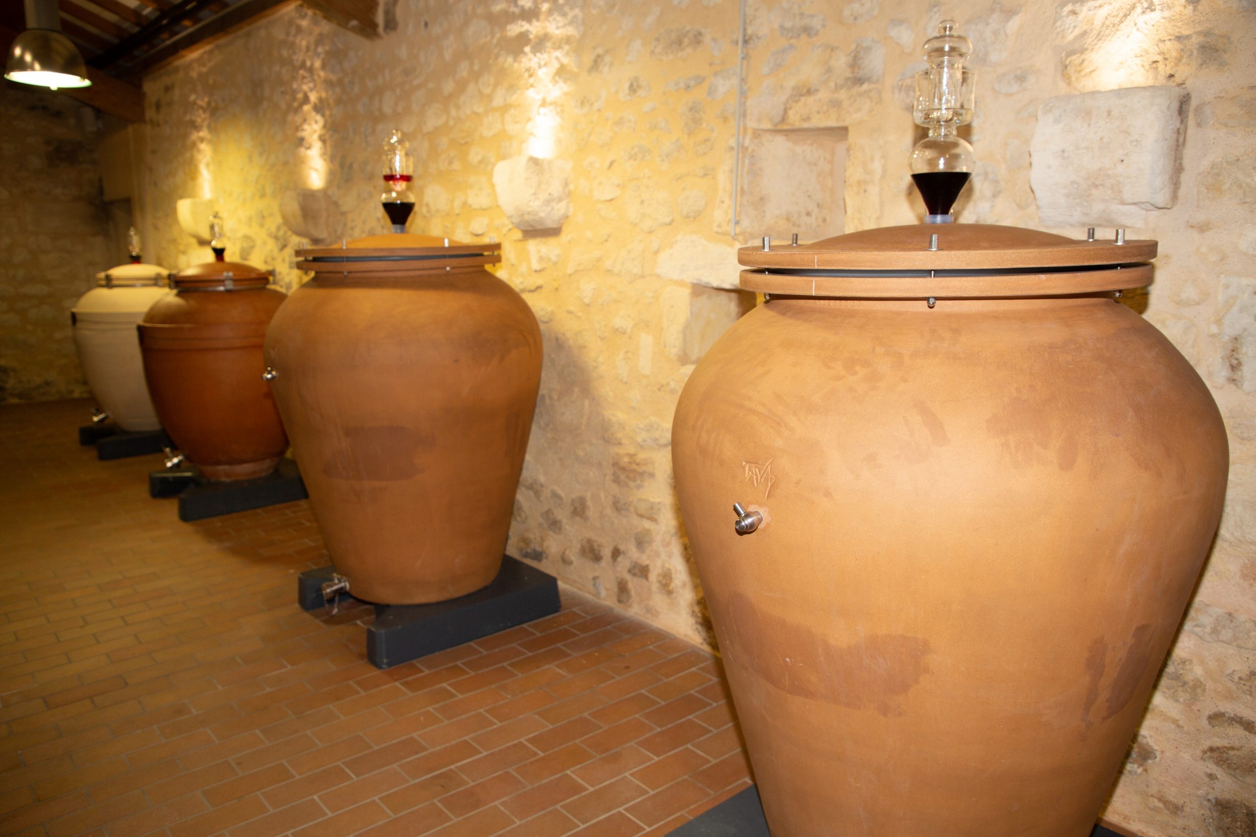 What are the materials used for wine containers?